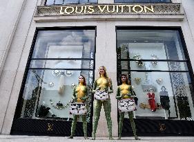 PETA Protests Exotic Skins Outside Vuitton in Paris