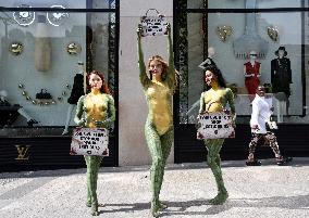 PETA Protests Exotic Skins Outside Vuitton in Paris