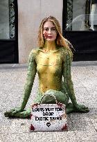 PETA Protests Exotic Skins Outside Vuitton in Paris