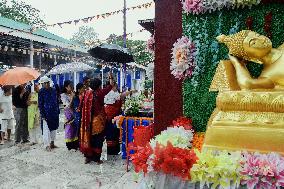 Devotees Pray at Buddha Temple - India