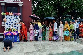 Devotees Pray at Buddha Temple - India