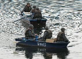 Search operation after Japan defense force jet's crash