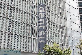 Dentsu exterior, logo and signage
