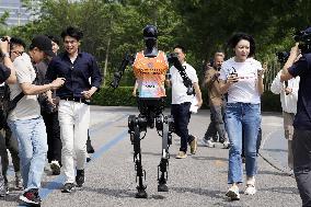 Winner of world's first humanoid half marathon