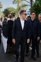Cannes Raphael Quenard, Francois Civil, Michel Hazanavicius walk with condor from Hotel Martinez MP