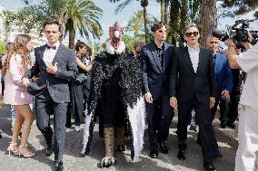 Cannes Raphael Quenard, Francois Civil, Michel Hazanavicius walk with condor from Hotel Martinez MP
