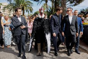 Cannes Raphael Quenard, Francois Civil, Michel Hazanavicius walk with condor from Hotel Martinez MP