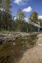 FINLAND - RUSSIA - BORDER - FENCE