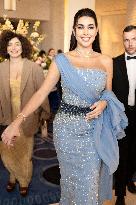 Cannes Yasmine Sabri leaves Hotel Martinez MP