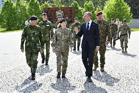KING CARL GUSTAF VISITS SWEDISH NATO SOLDIERS