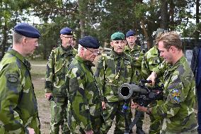 KING CARL GUSTAF VISITS SWEDISH NATO SOLDIERS