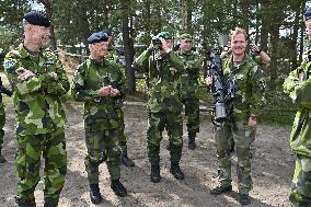 KING CARL GUSTAF VISITS SWEDISH NATO SOLDIERS