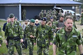 KING CARL GUSTAF VISITS SWEDISH NATO SOLDIERS