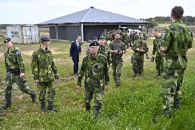 KING CARL GUSTAF VISITS SWEDISH NATO SOLDIERS