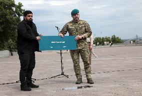 Inauguration of Marine Corps memorial sign in Kyiv
