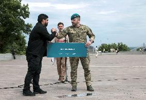 Inauguration of Marine Corps memorial sign in Kyiv