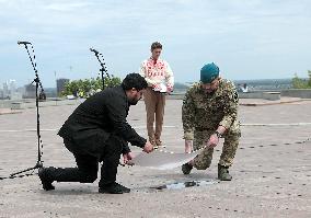 Inauguration of Marine Corps memorial sign in Kyiv