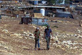 Settlers' Harrasement Forces Palestinians to Leave