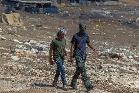 Settlers' Harrasement Forces Palestinians to Leave
