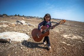 Settlers' Harrasement Forces Palestinians to Leave