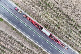 Huge Transformers Transportation