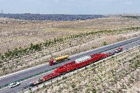 Huge Transformers Transportation