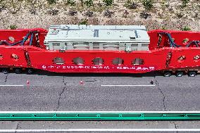 Huge Transformers Transportation