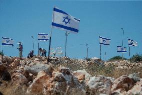 Settlers Raise Flags In Bruqin - West Bank