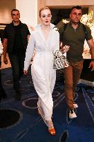 Cannes Elle Fanning leaves Hotel Martinez MP