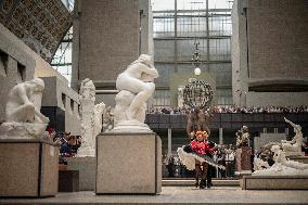 Moulin Rouge dancers perform at the Musee d'Orsay