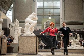 Moulin Rouge dancers perform at the Musee d'Orsay