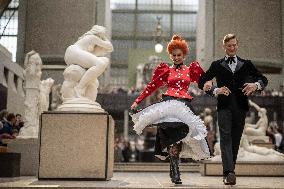 Moulin Rouge dancers perform at the Musee d'Orsay