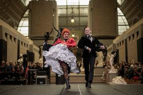 Moulin Rouge dancers perform at the Musee d'Orsay