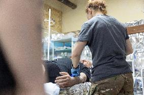 Ukrainian Medics Assist Wounded Soldier in Kharkiv