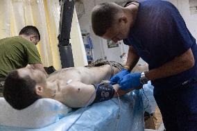 Ukrainian Medics Assist Wounded Soldier in Kharkiv