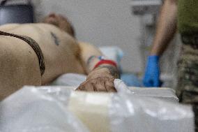 Ukrainian Medics Assist Wounded Soldier in Kharkiv