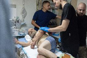 Ukrainian Medics Assist Wounded Soldier in Kharkiv