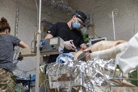 Ukrainian Medics Assist Wounded Soldier in Kharkiv
