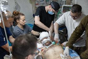 Ukrainian Medics Assist Wounded Soldier in Kharkiv