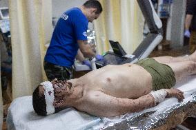 Ukrainian Medics Assist Wounded Soldier in Kharkiv