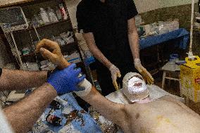 Ukrainian Medics Assist Wounded Soldier in Kharkiv
