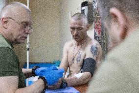 Ukrainian Medics Assist Wounded Soldier in Kharkiv