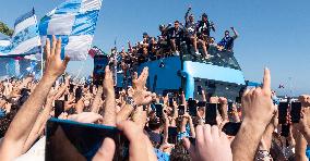 Napoli Team Bus Parades Along Seafront with Fans - Italy
