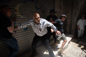 Far-Right Israeli Activists Clash with A Palestinian Man - Jerusalem