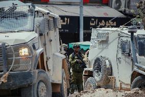 Israeli Forces Raid Financial Sites in Jenin - Palestine