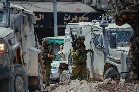 Israeli Forces Raid Financial Sites in Jenin - Palestine