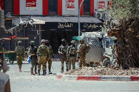 Israeli Forces Raid Financial Sites in Jenin - Palestine