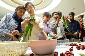 Foreigners Experience China Dragon Boat Festival