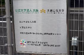 Signage and logo of  Osaka Metropolitan University Corporate Headquarters