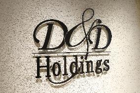 D&D Holdings signage and logo